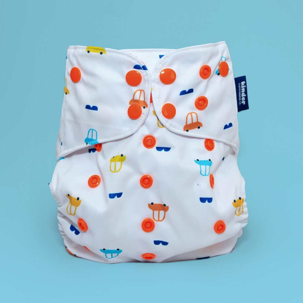 Kinder waterproof tummy panel close-up demonstrating leak protection for tummy sleepers.