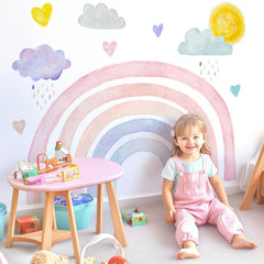 Kingarch large boho rainbow wall decal adds vibrant color to a cheerful kid's room.