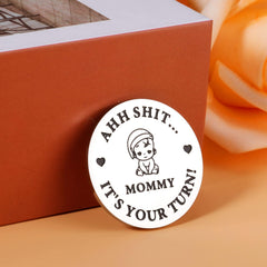 KINMES decision coin showing Mommy's Turn for shared parenting decisions.