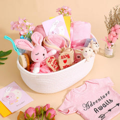 Kipwake pink rattle included for baby's early sensory play and soothing sounds.