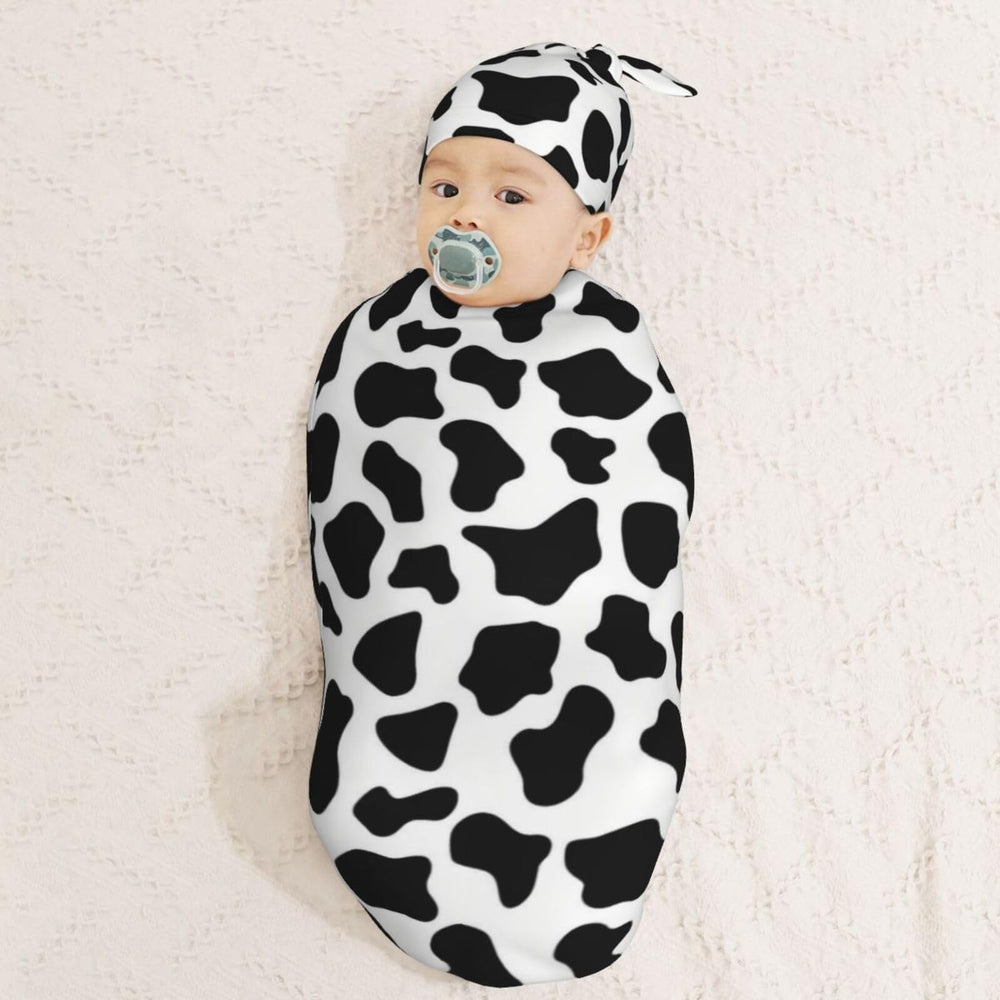 KiuLoam adjustable knot swaddle top for a secure, gentle fit.