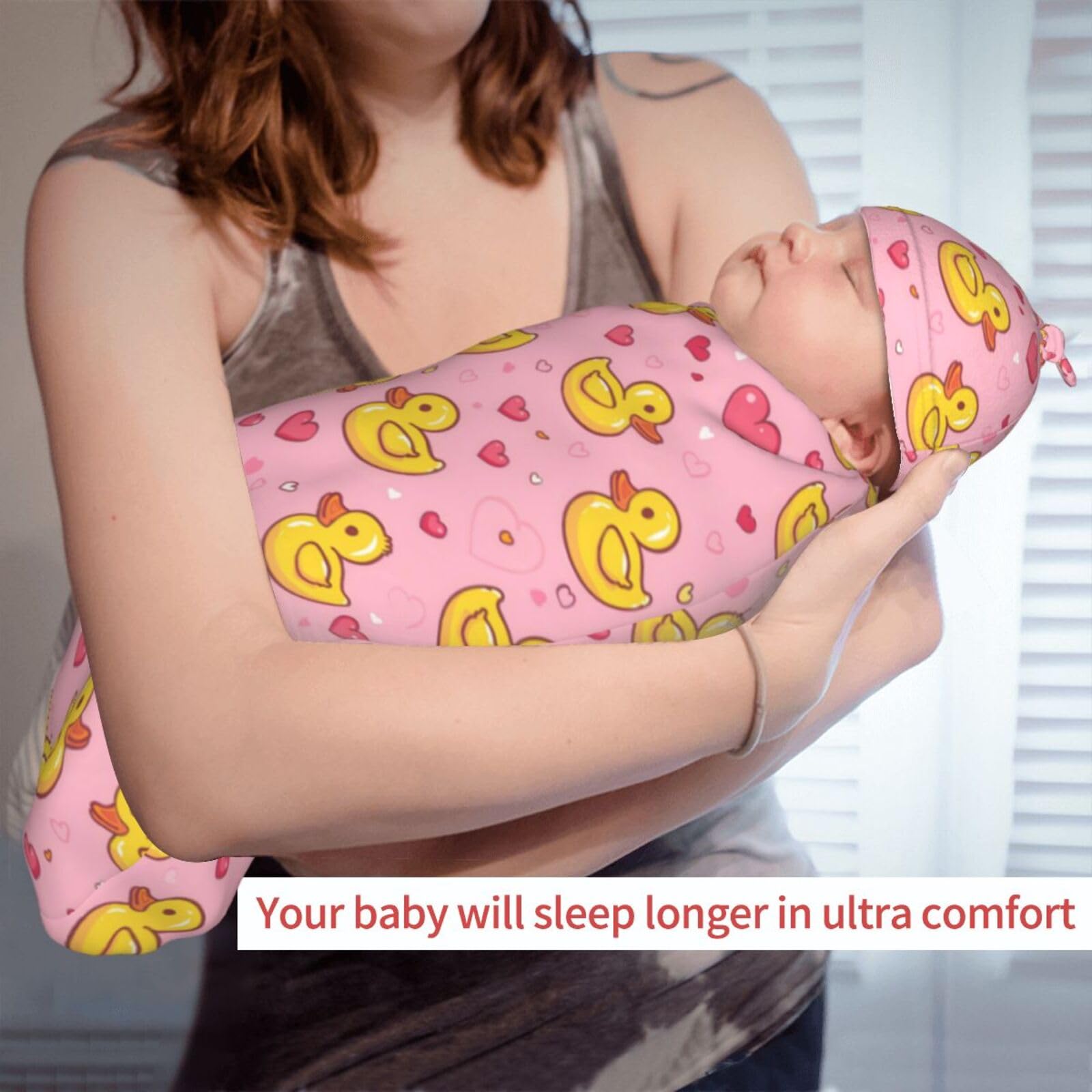 KiuLoam multi-use swaddle supports nursing, stroller cuddles, and hospital wear.