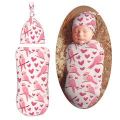 KiuLoam pink parrots swaddle blanket showcases a cozy cocoon for newborn warmth.