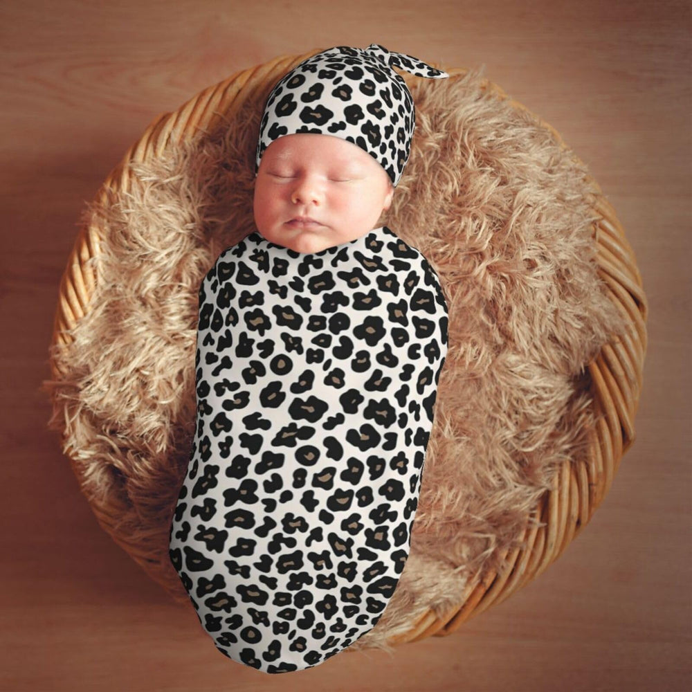 KiuLoam newborn photo prop setup with stylish leopard print.
