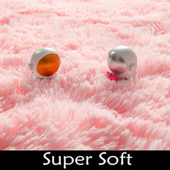 Cute pink decor rug that complements girls' bedroom or nursery styling.