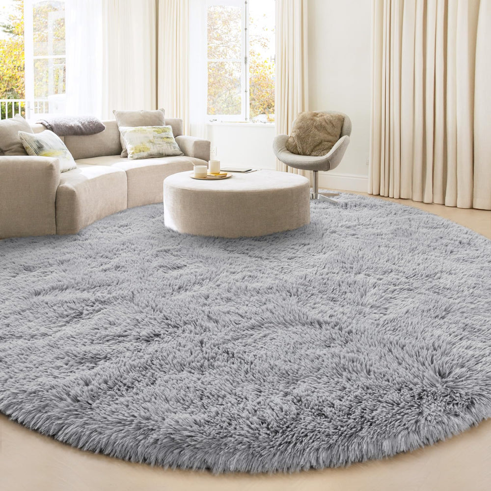 KIXINWA round rug fluffy surface delivers plush comfort in bedrooms.