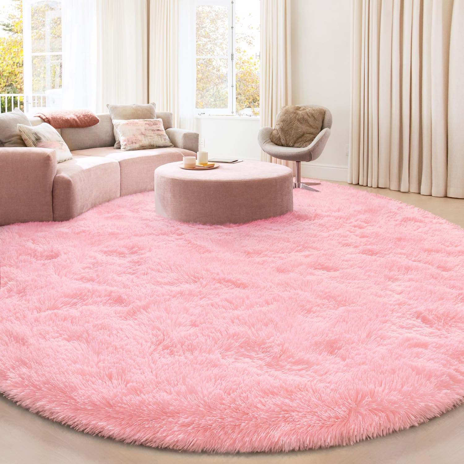 KIXINWA round pink rug shows plush texture for cozy feet and warm evenings.