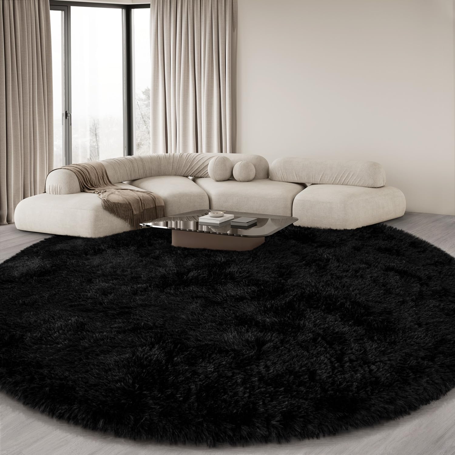 KIXINWA round rug perfect for bedrooms and nurseries with soft underfoot feel.