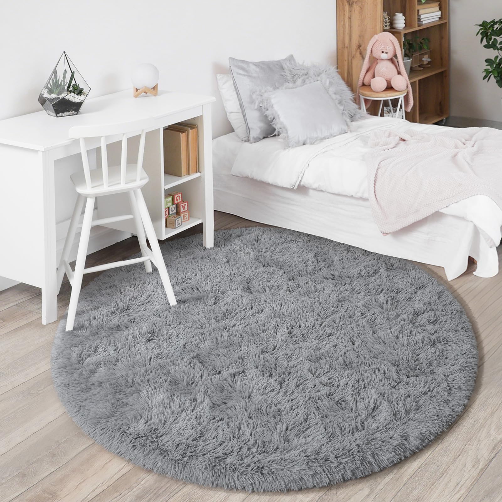 KIXINWA round grey rug complements modern living room design