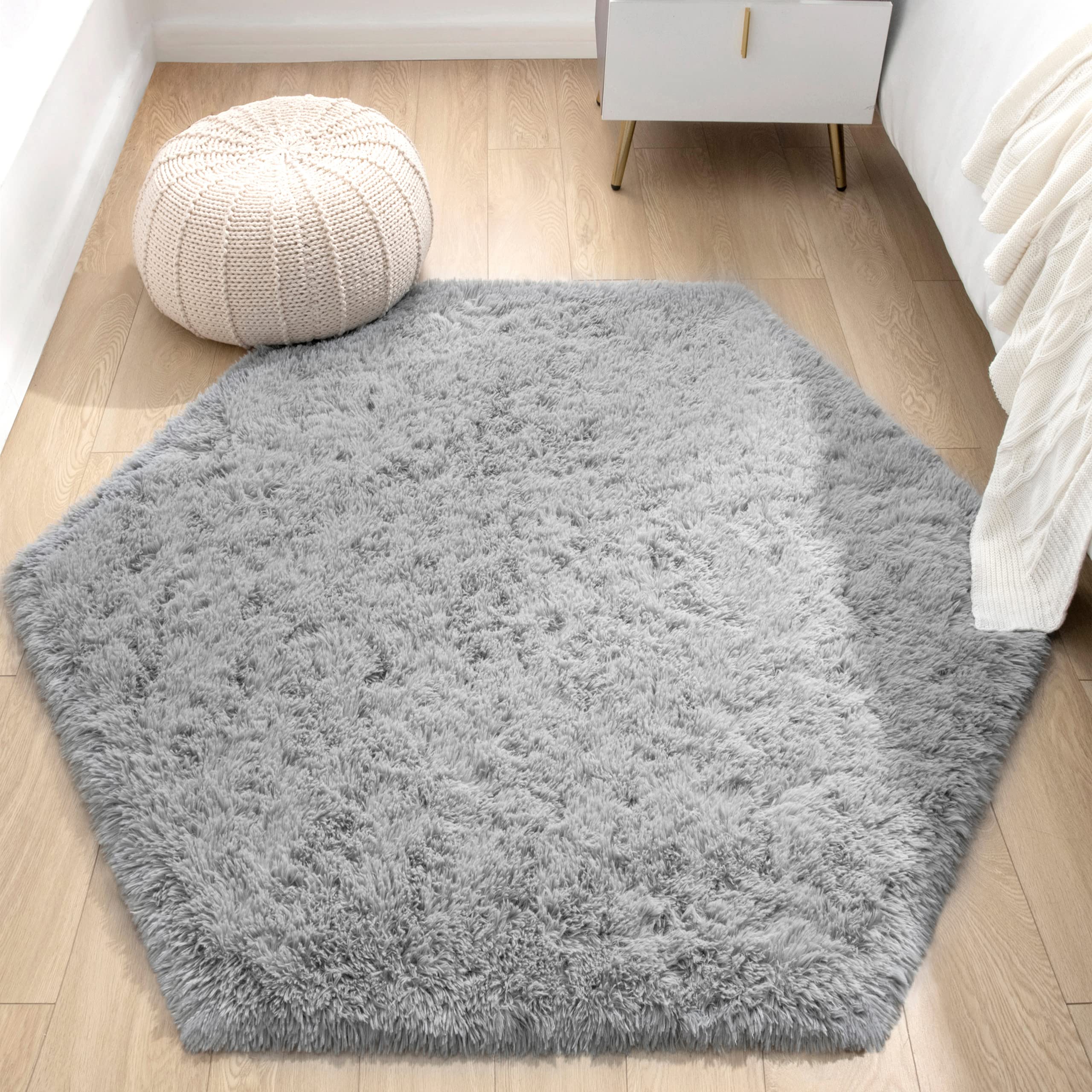 KIXINWA vacuum-packaged rug unfolds with fluff after 2–3 days of recovery.