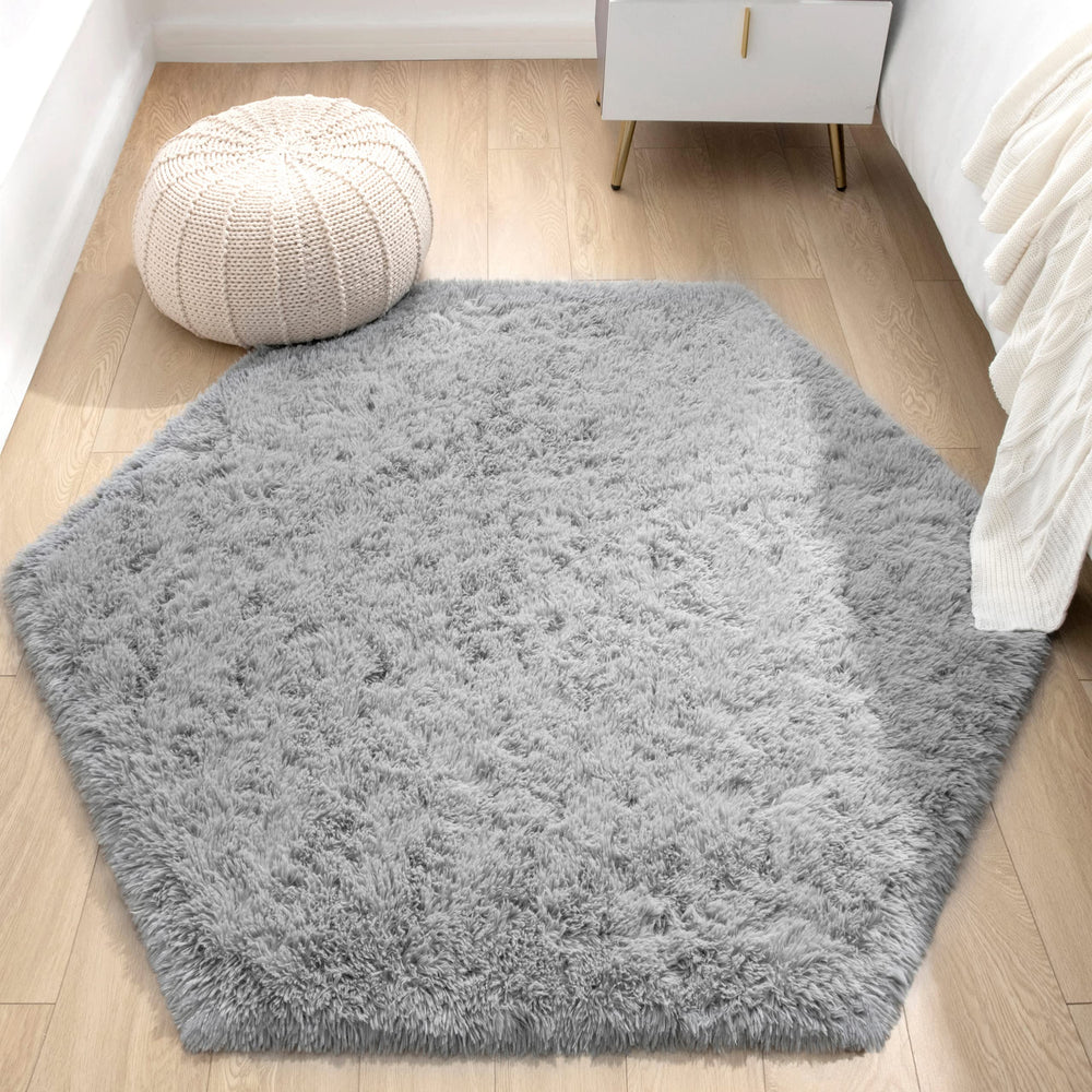 KIXINWA vacuum-packaged rug unfolds with fluff after 2–3 days of recovery.