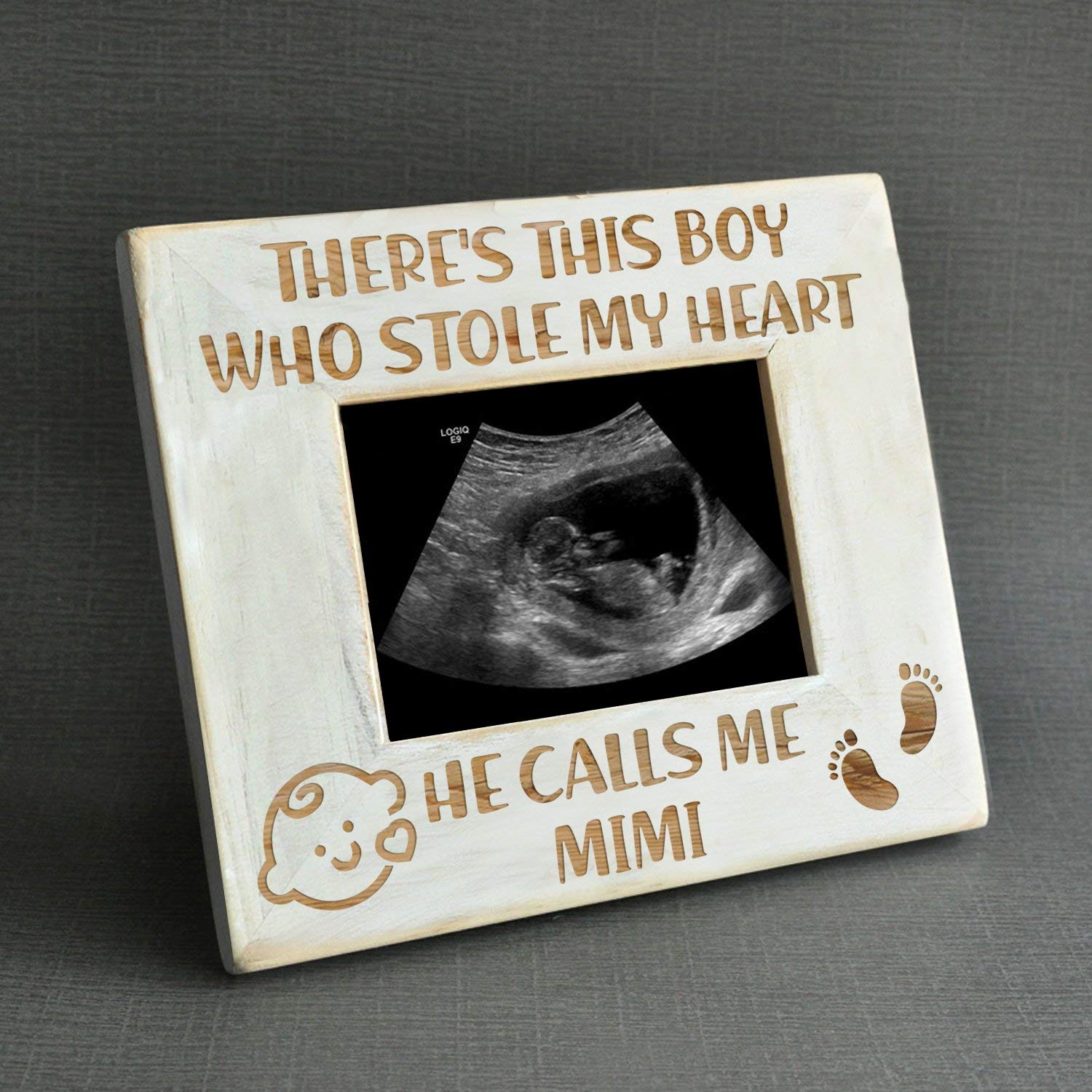 K KENON frame featuring Winnie the Pooh sonogram for newborn keepsakes.