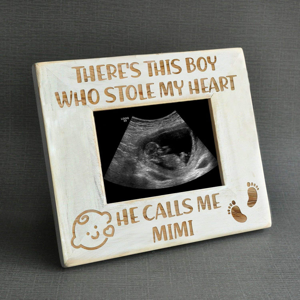K KENON frame featuring Winnie the Pooh sonogram for newborn keepsakes.