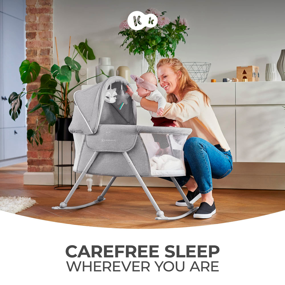 kk Kinderkraft LOVI travel bassinet folded compactly for packing.