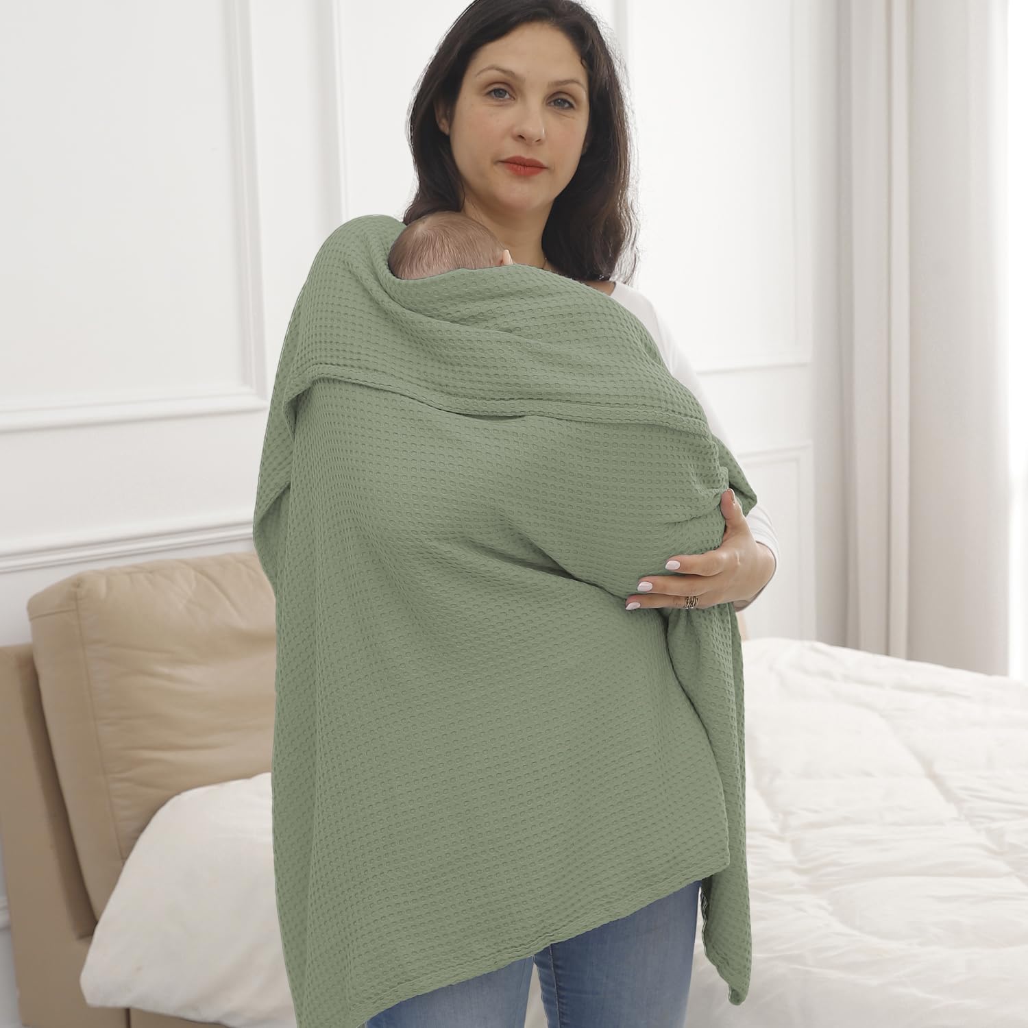 Kloovete Sage blanket laid as a bedside bed cover at night.