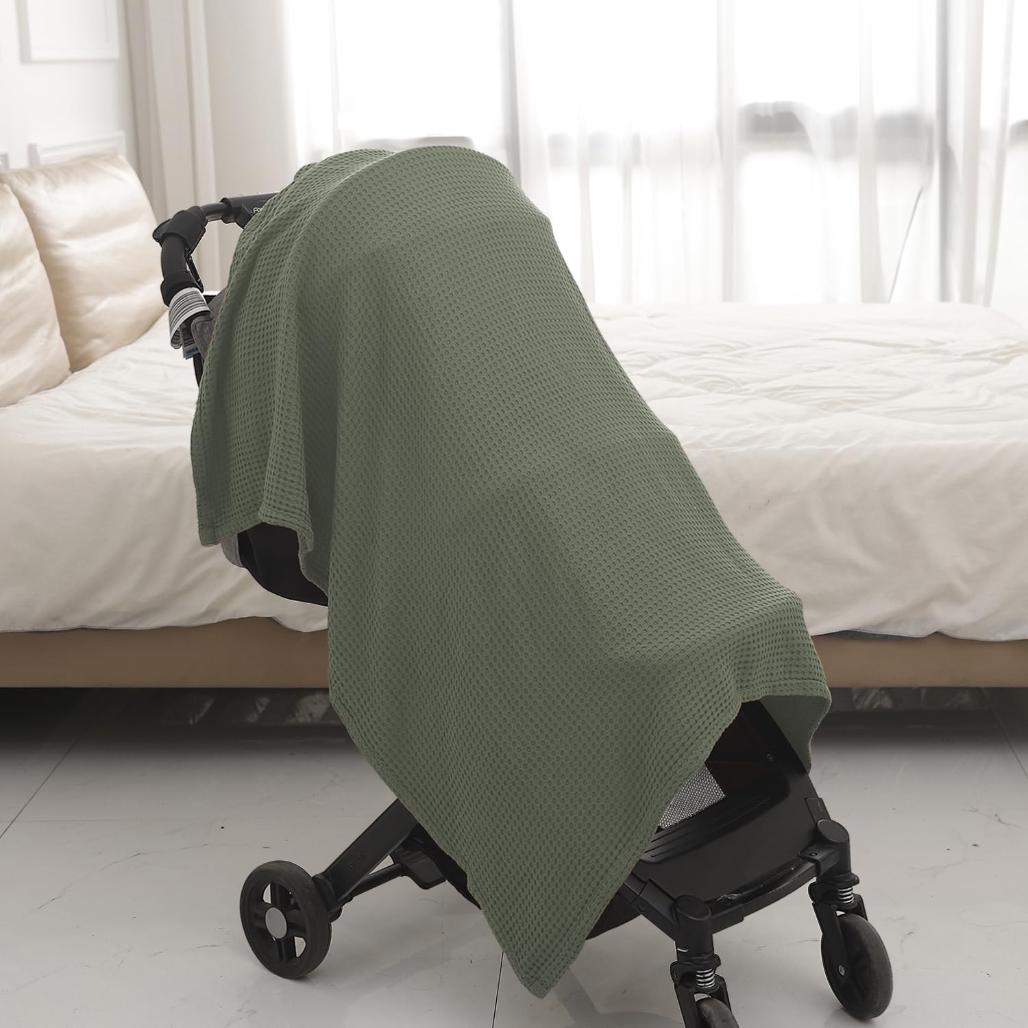 Kloovete Sage blanket care: machine wash warm and tumble dry.