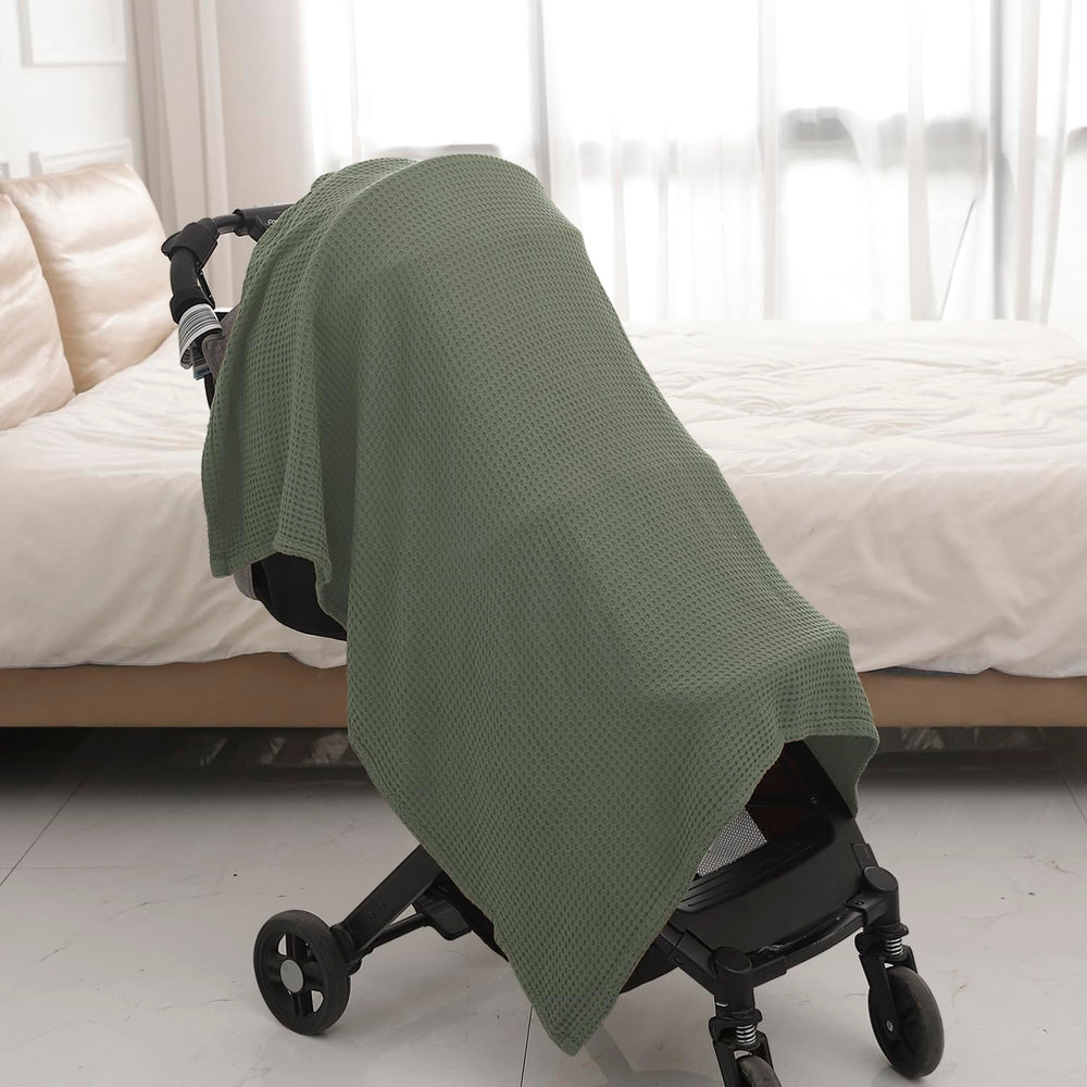 Kloovete Sage blanket care: machine wash warm and tumble dry.