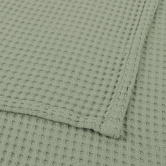 Kloovete Sage blanket used on a stroller for on-the-go protection.