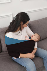 Kloovete baby wrap stretchy fabric demonstrates flexible, comfortable wear.
