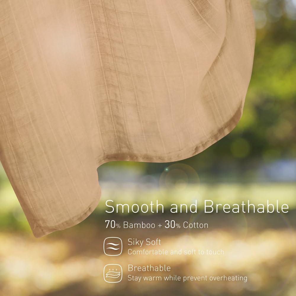 Knirose swaddle and stroller cover providing shade on outings.