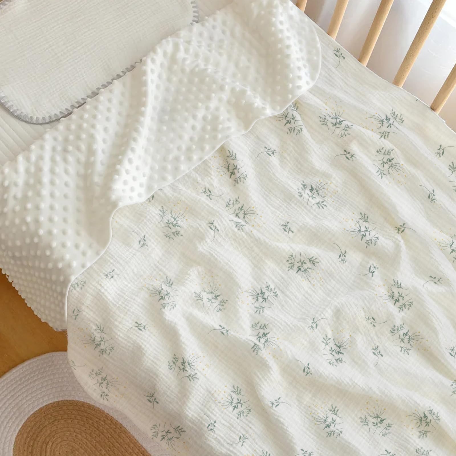 Knirose unisex baby blanket in a neutral, versatile style.