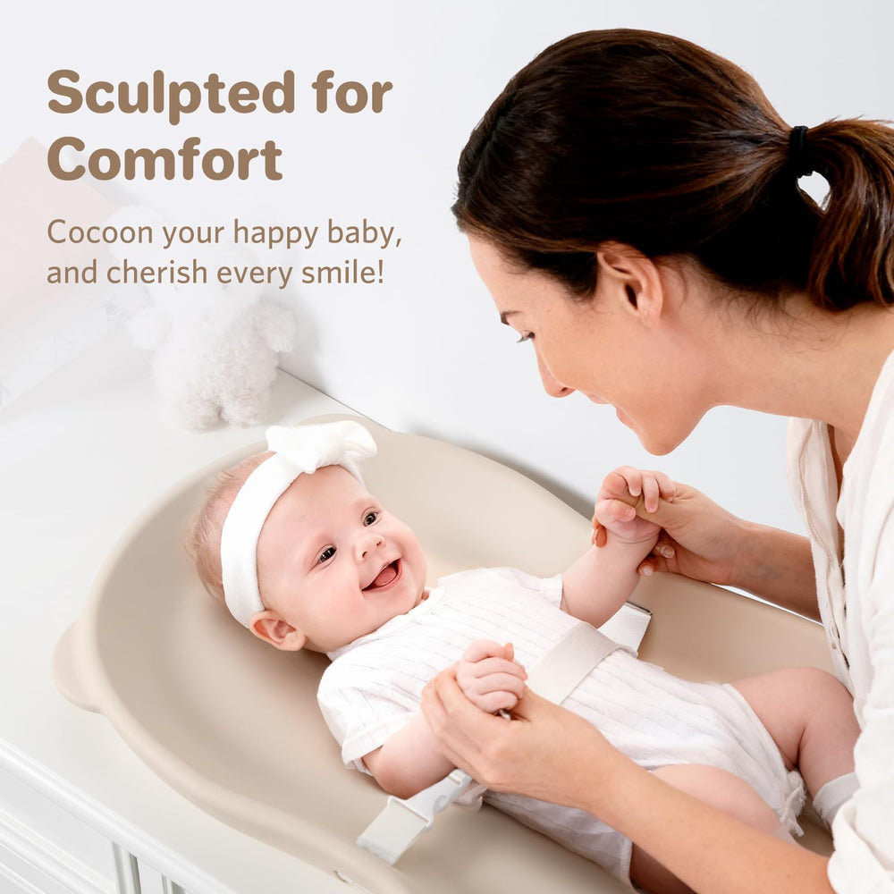 Knirose teddy bear design changing pad adds nursery charm.