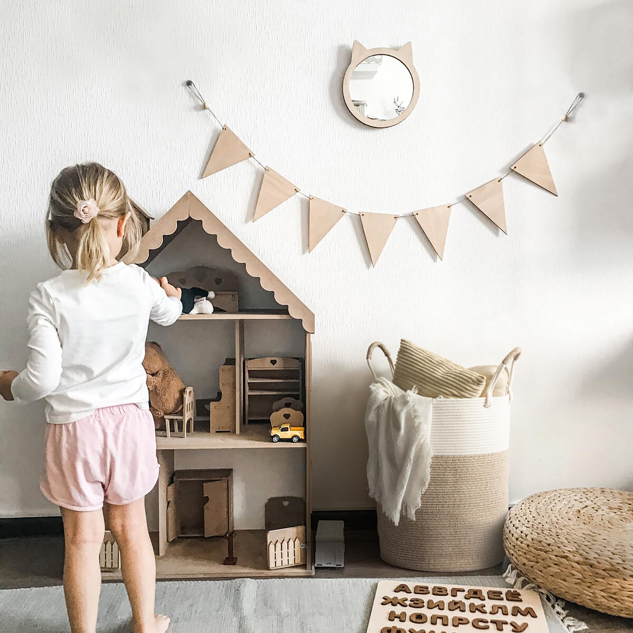 Kodomoore living room organization basket neatly stores cushions and throws.