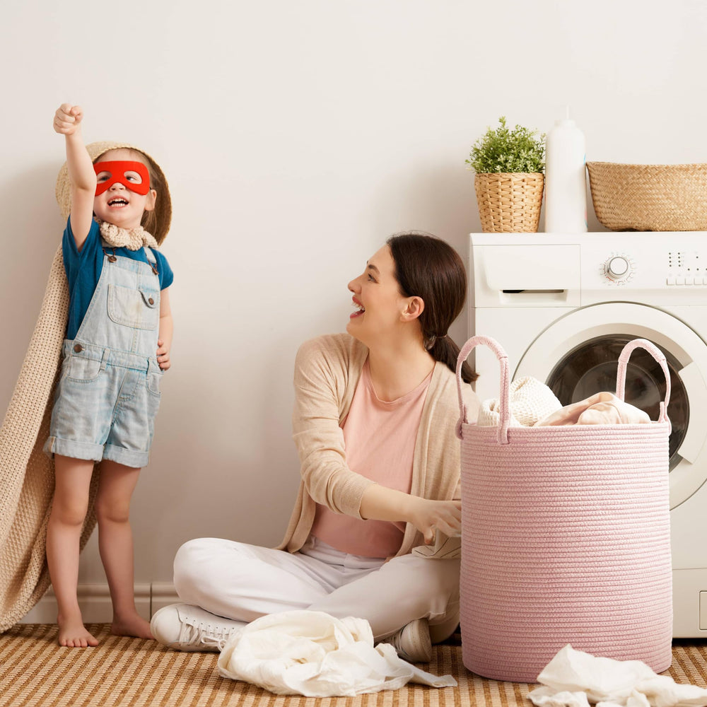 Kodomoore laundry basket rose stacked-blankets highlights cozy, accessible blanket storage.