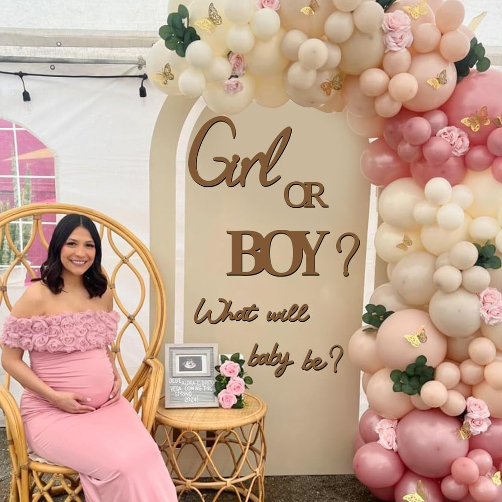 Kokolap balloon arch decor with wood decals complements balloon displays.