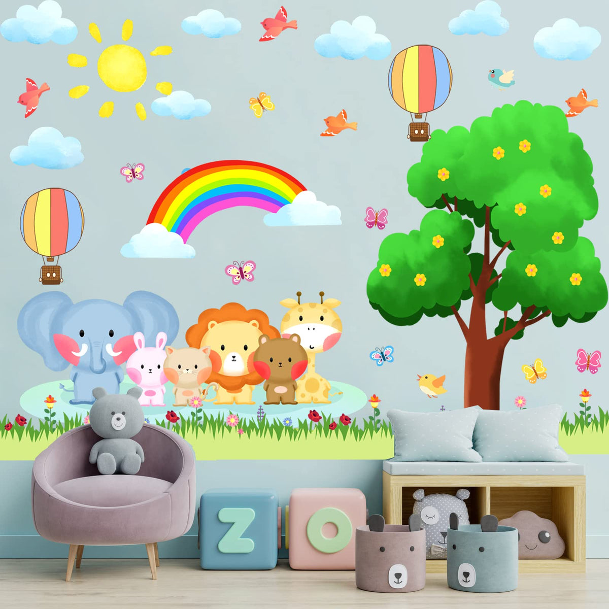 KOKOLAP elephant wall sticker perched on a leafy tree for nursery decor.