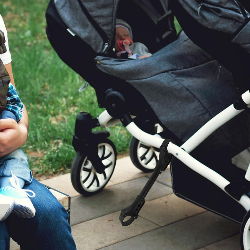 KOMBIUDA compact black design stroller connector fits most strollers
