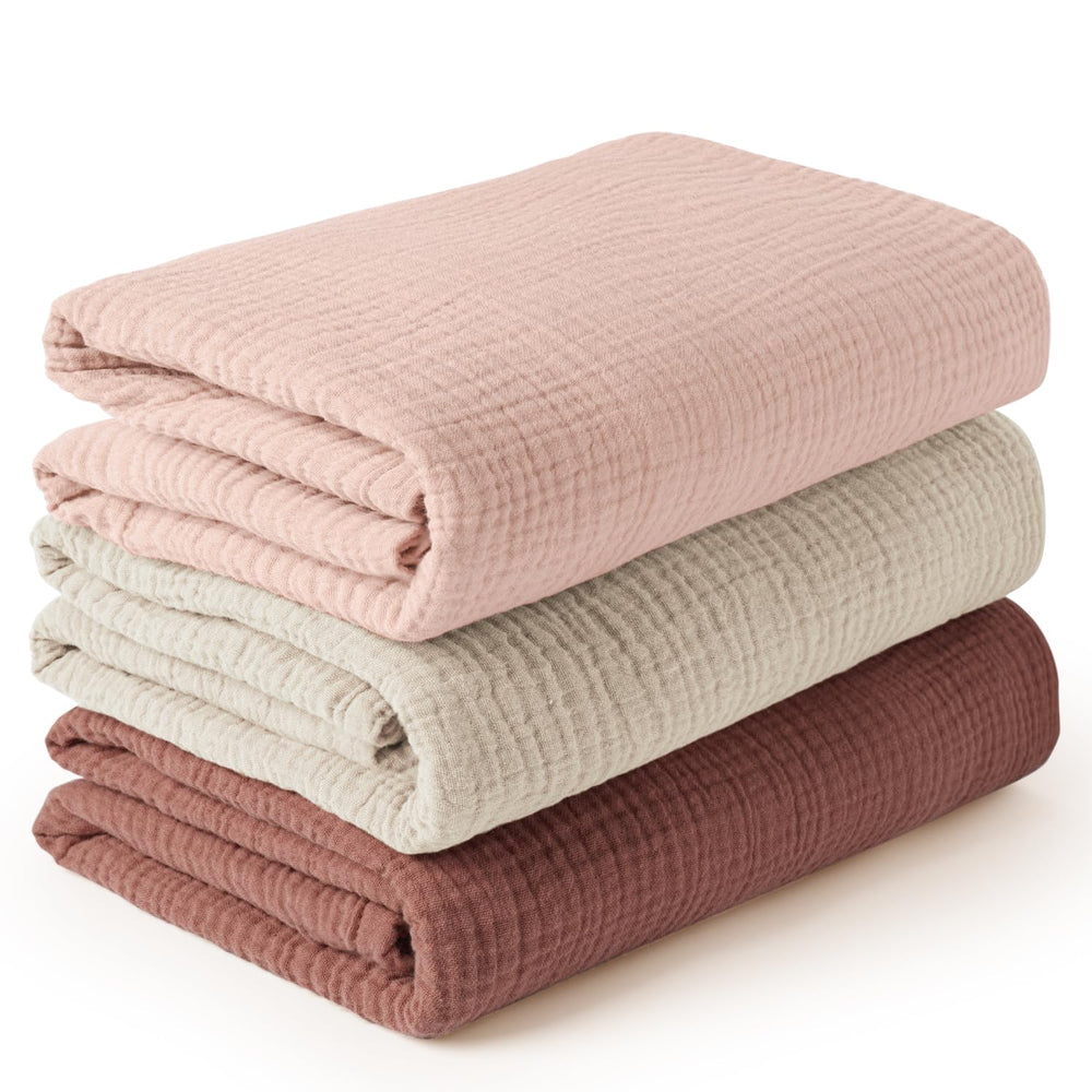 Konssy 3-pack muslin swaddle set—soft blankets for newborn comfort.