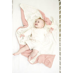 Konssy baby blanket shown swaddled for newborn snugness