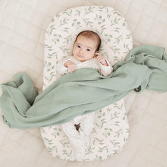 Konssy lounger cover in green leaves, stretchy fabric for a secure fit