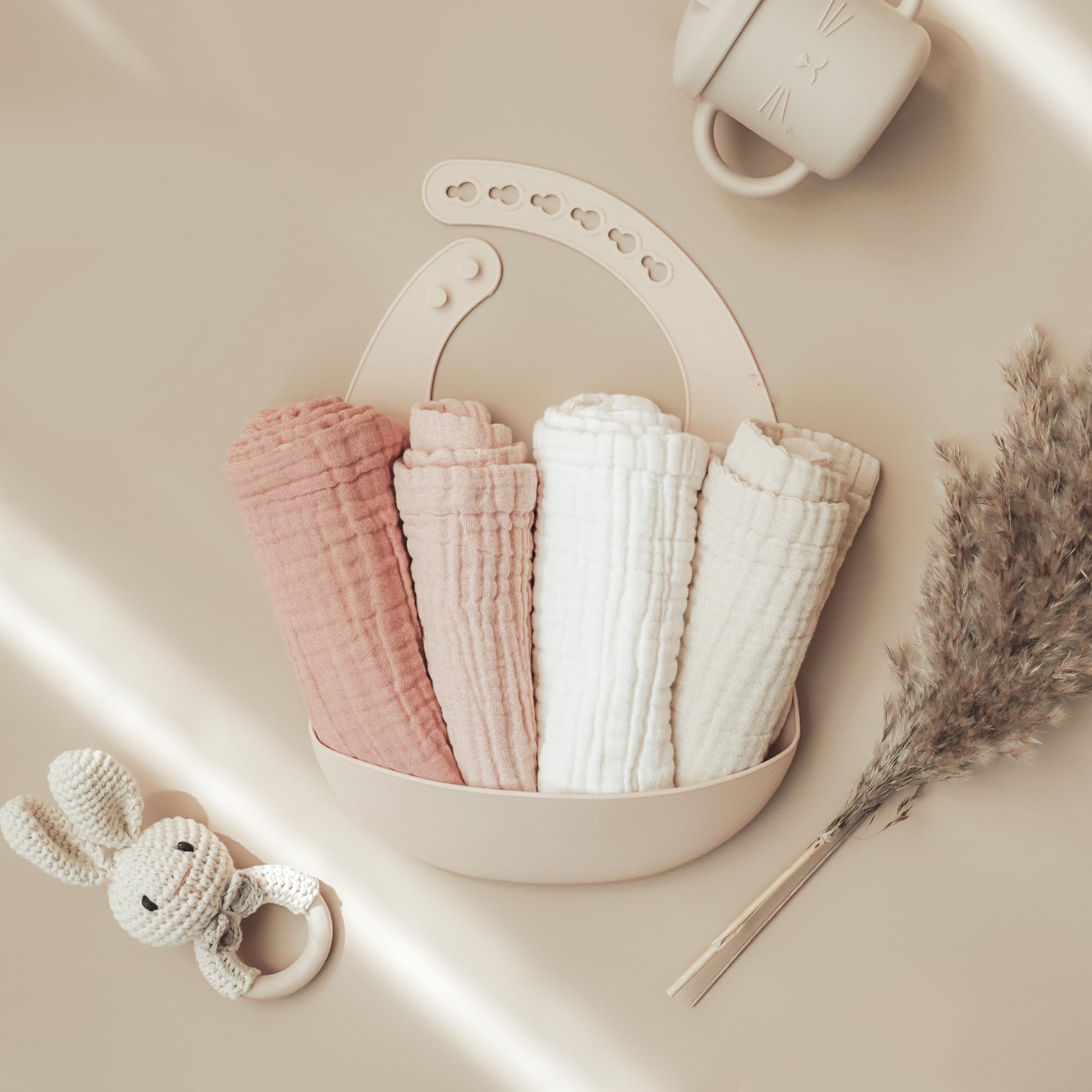 Konssy baby muslin washcloths 11 by 11 inches size demonstrated for generous coverage.