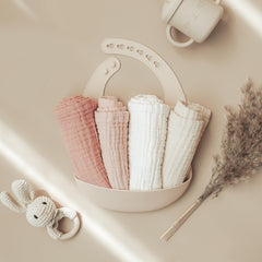 Konssy baby muslin washcloths 11 by 11 inches size demonstrated for generous coverage.