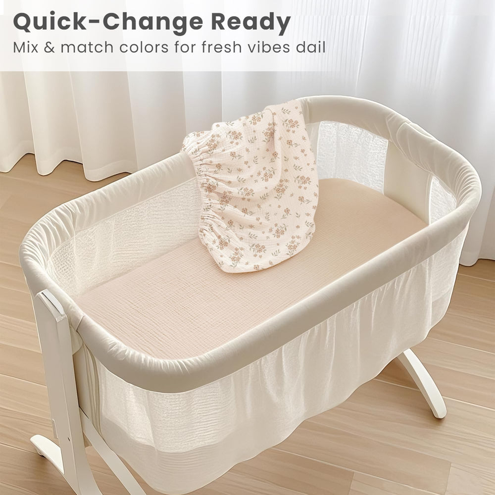Konssy bassinet sheets in green floral design add charm and comfort.