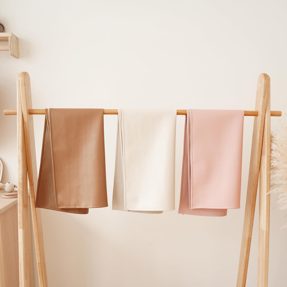 Konssy brown/beige faux leather mat combines durability with style.