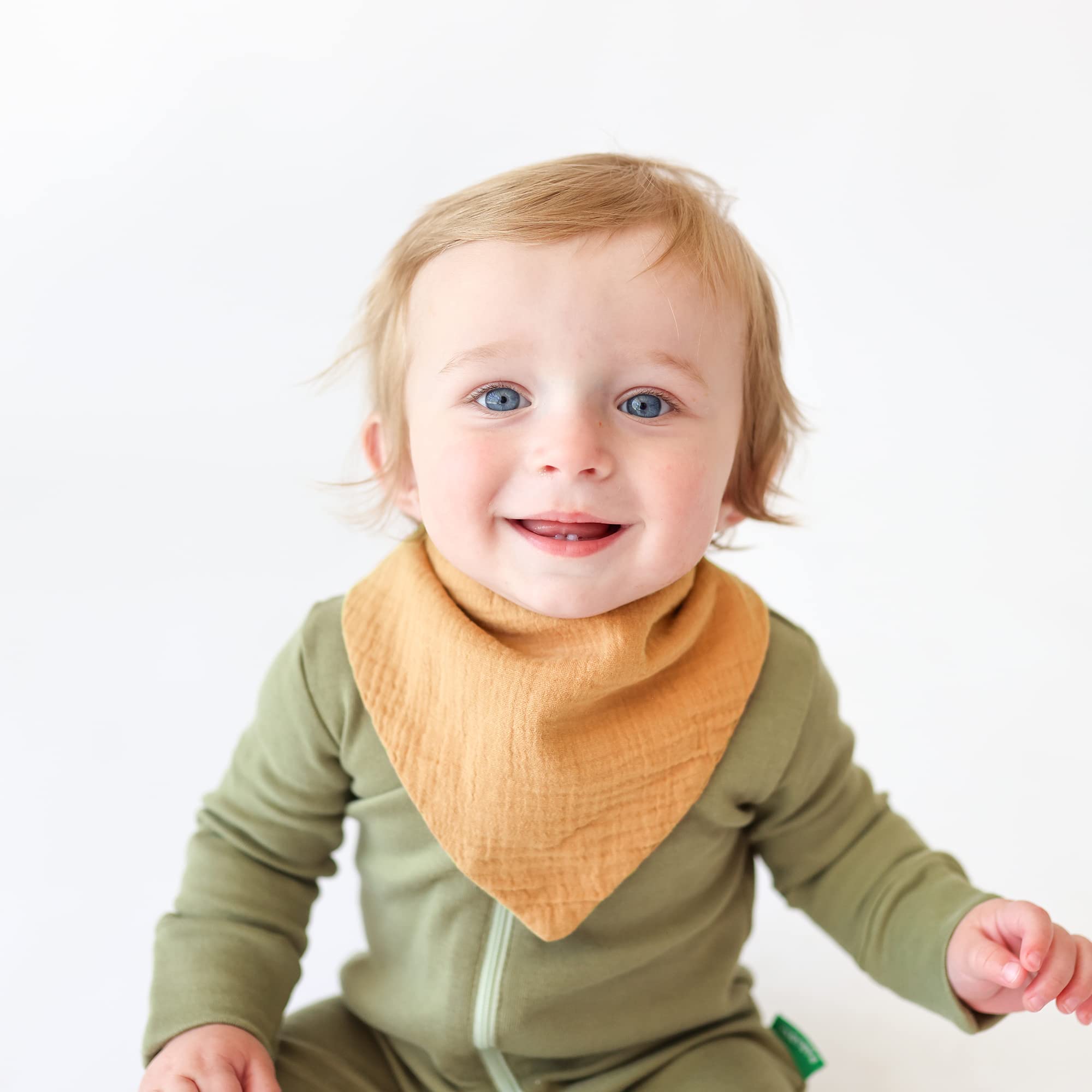 Konssy cotton muslin bibs offer a soft touch during teething.