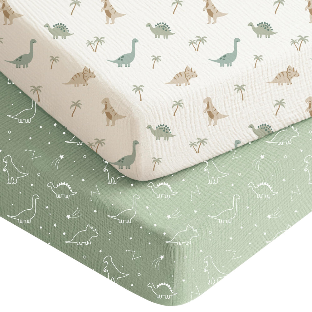 Konssy Dino Jungle crib sheet for a soft, breathable baby's sleep surface
