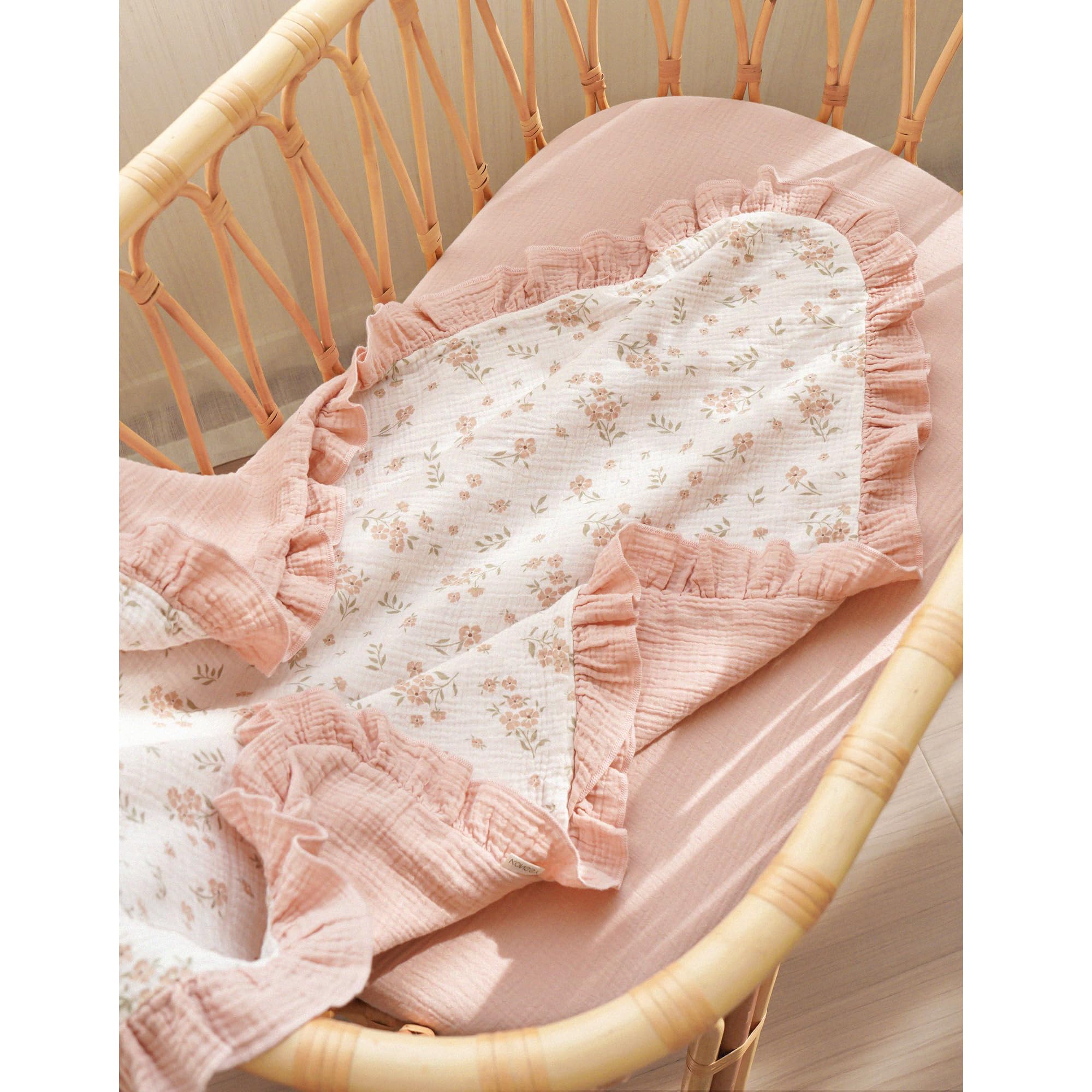 Konssy Blossom blanket in nursery decor, adds elegant style to crib time.