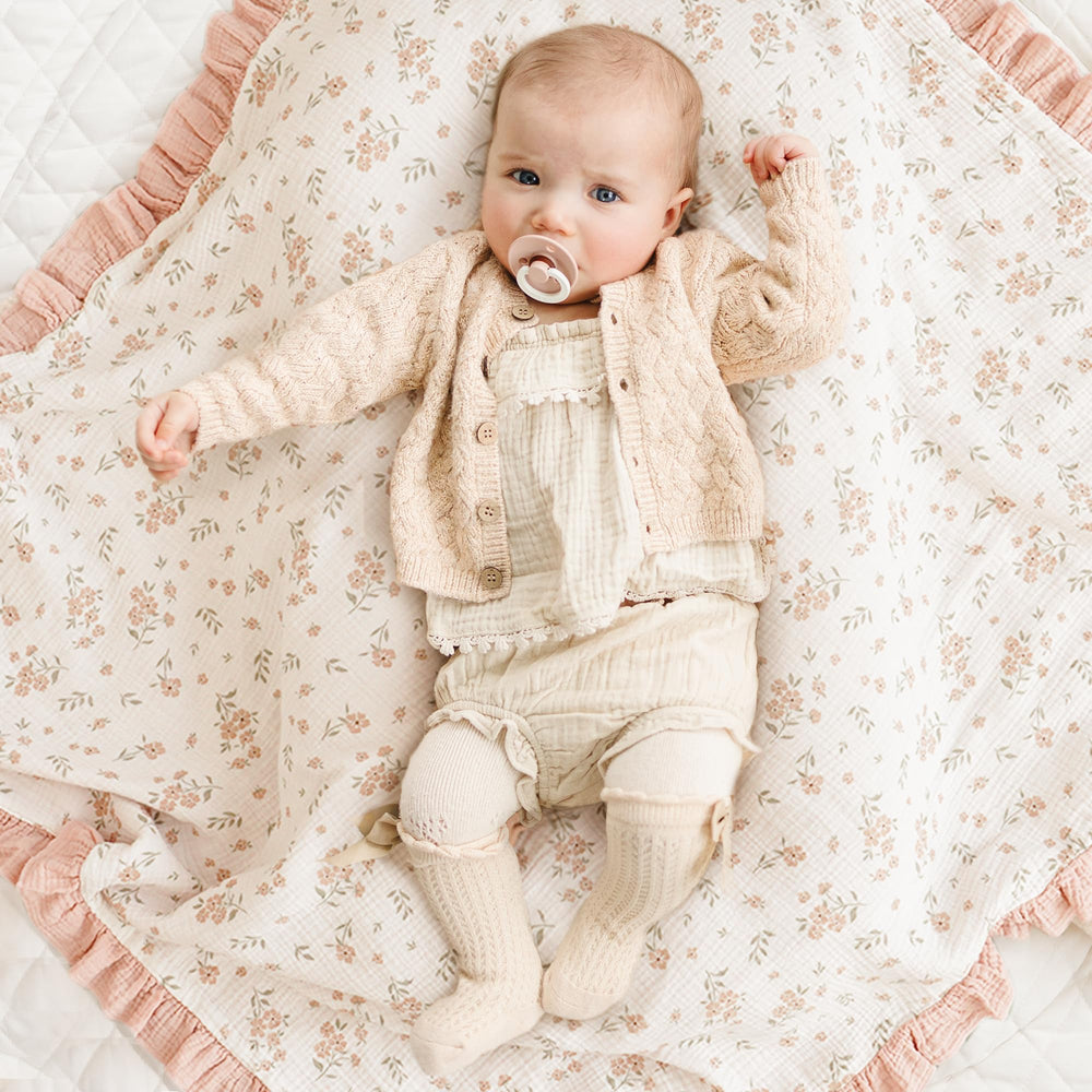 Konssy Blossom blanket in stroller usage, shade and cozy coverage for outings.