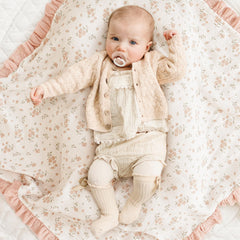 Konssy Blossom blanket in stroller usage, shade and cozy coverage for outings.