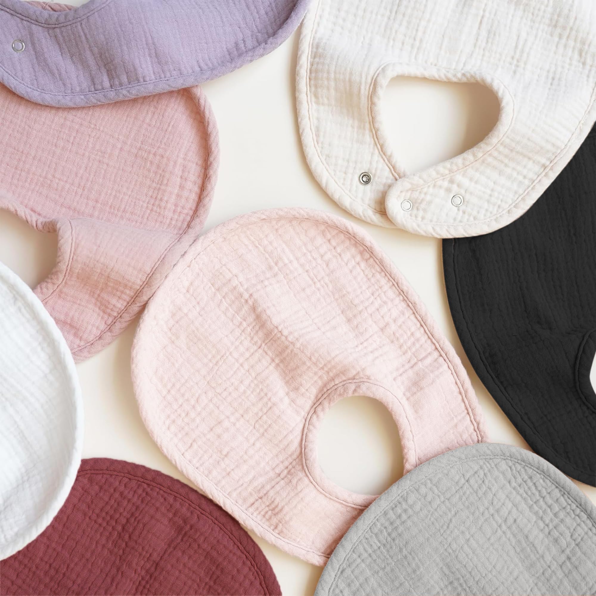 Konssy gift-ready baby bibs in eight-pack packaging for baby showers.