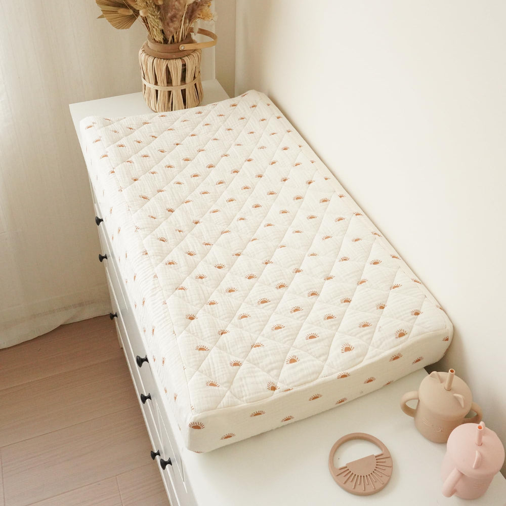 Konssy gift-ready changing pad cover ideal for baby showers.