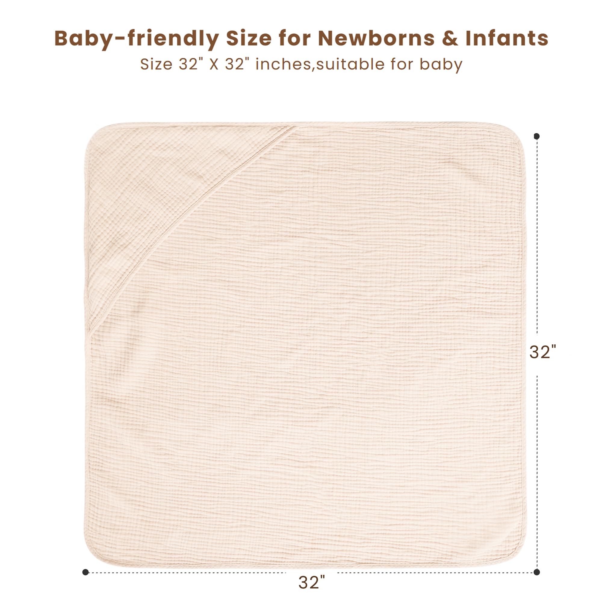 A baby wrapped in cream Konssy hooded towel after bath for warmth