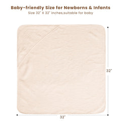 A baby wrapped in cream Konssy hooded towel after bath for warmth