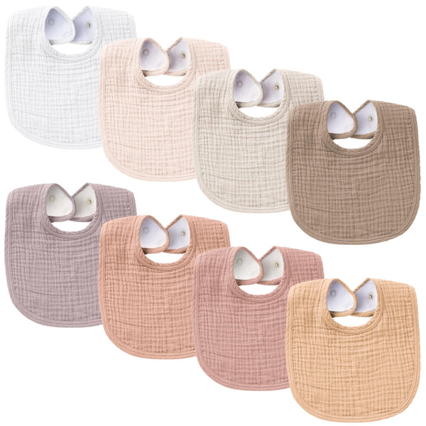 Konssy muslin baby bibs flat lay eight-pack for quick drool cleanup.
