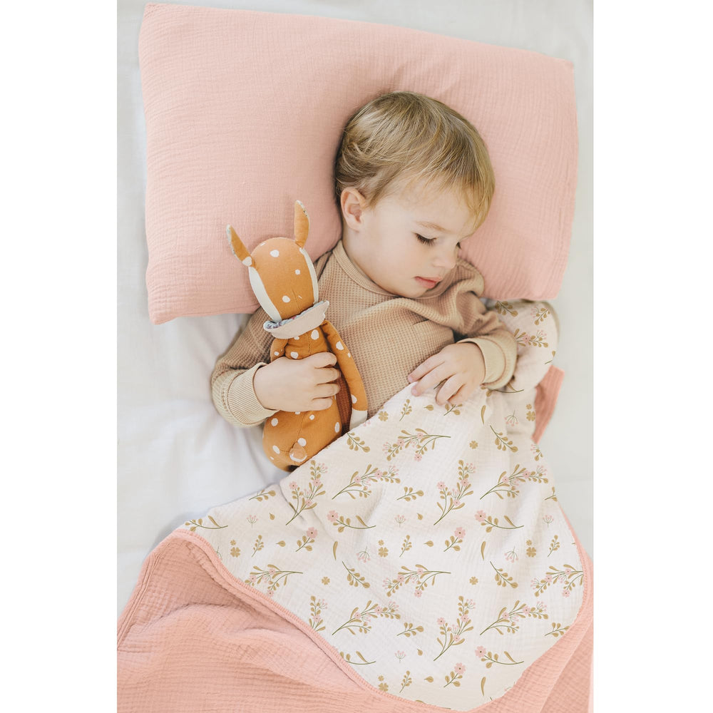Konssy muslin blanket folded close-up showing breathable fabric for naps