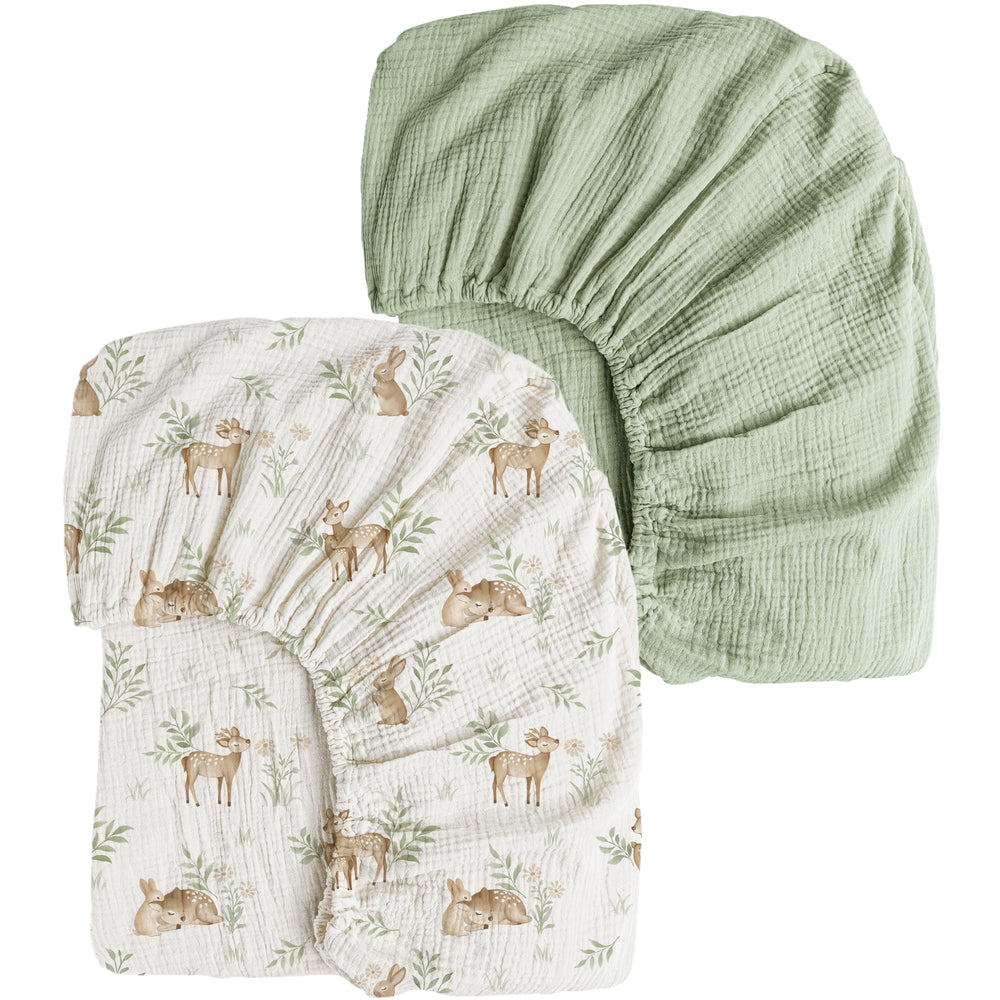 Konssy muslin crib sheet forest print keeps baby cozy and breathable.